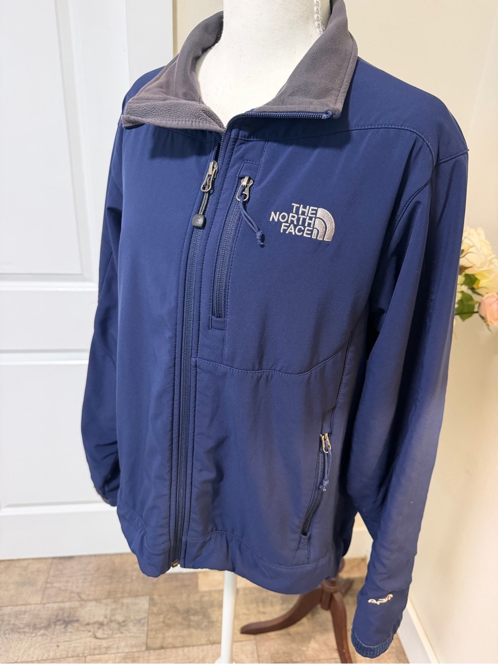 The North Face Men's Navy Blue Softshell Jacket with Gray Collar